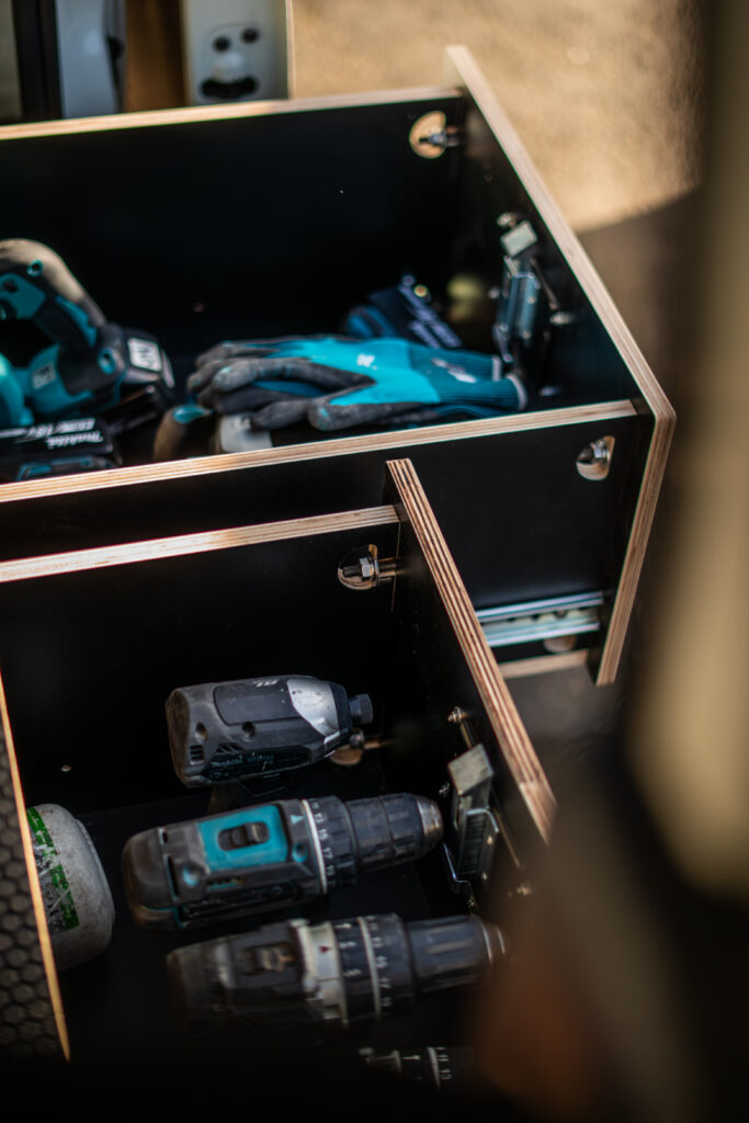 Workvan storage system designed by industrial designer Auckland-based Evan Thomas – modular drawer units installed in a trade van.